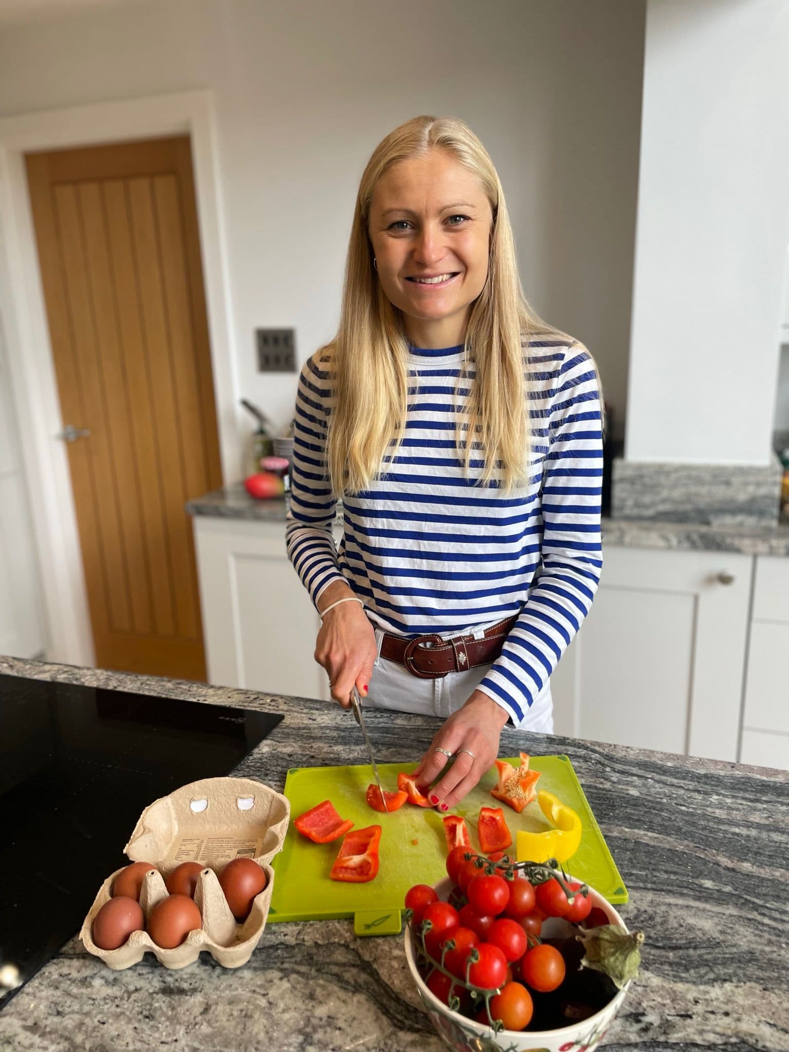 A BioChef preparing vegetables in a home kitchen