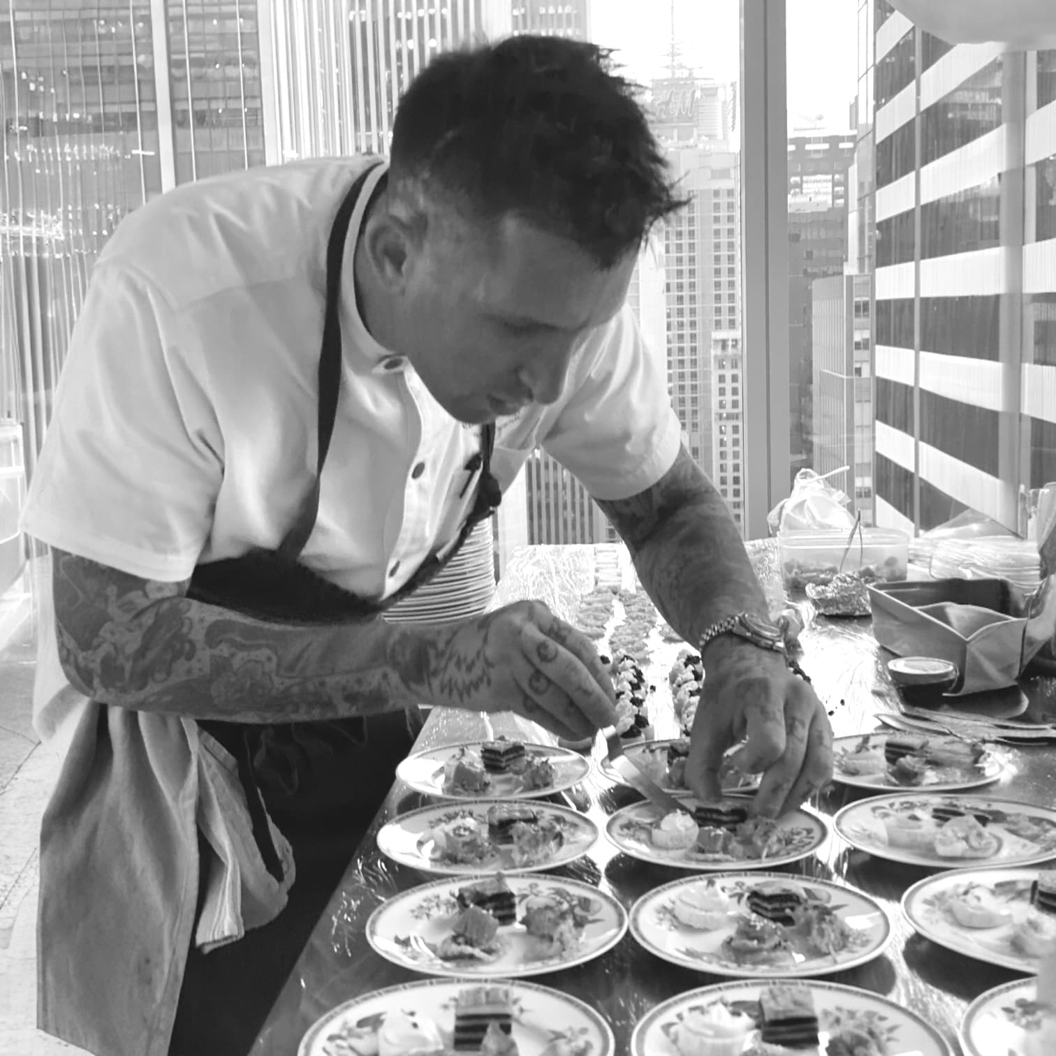 A BioChef plating a service